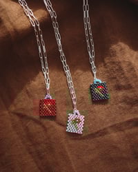 Image 3 of flower bud chain charmer (maroon)