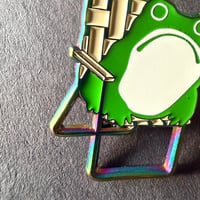 Image 2 of Sumi Frog in Lawn Chair Enamel Pin in Rainbow Plating
