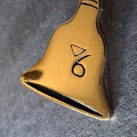 Image 2 of Gladys's Golden Bell Enamel Pin