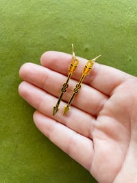 Image 2 of Knotted Arrow Hard Enamel Earrings