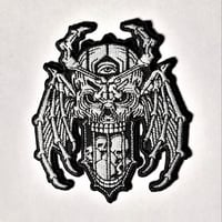 Image 1 of One Eyed Bat Winged Skull Hourglass Embroidered Patch With A Merrowed Edge