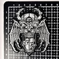 Image 3 of One Eyed Bat Winged Skull Hourglass Embroidered Patch With A Merrowed Edge