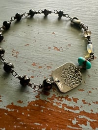 Image 7 of faceted gemstone and sterling silver medallion bracelet