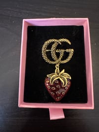 GG strawberry brooch