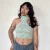 speckled sleeveless turtleneck