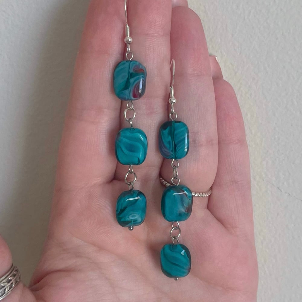 Image of peacock feather earrings