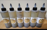 Image 1 of SJE NATURAL HAIR GROWTH OIL 4OZ.