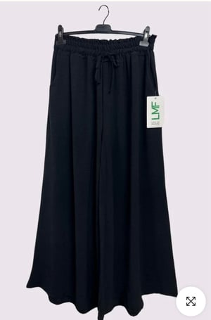 Image of Plain Side Pockets Wide Legs Trousers