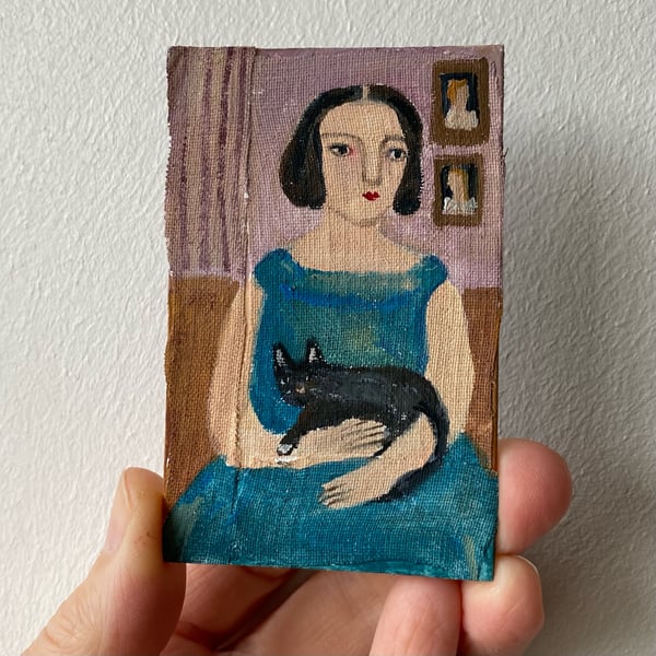Image of Lady with her pet cat - tiny portrait 