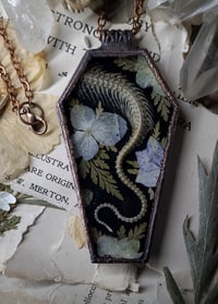 Image 1 of Coffin Amulet - Snake Tail Skeleton and Floral