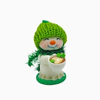 Image 1 of St. Patrick’s Day Snowman with cup of coffee