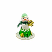 Image 1 of St. Patrick’s Day Dessert Snowman with gold shamrock