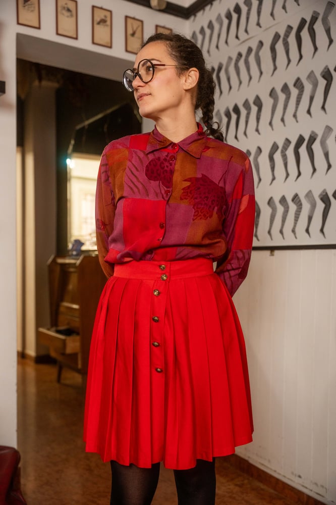 Image of Gonna a pieghe rossa