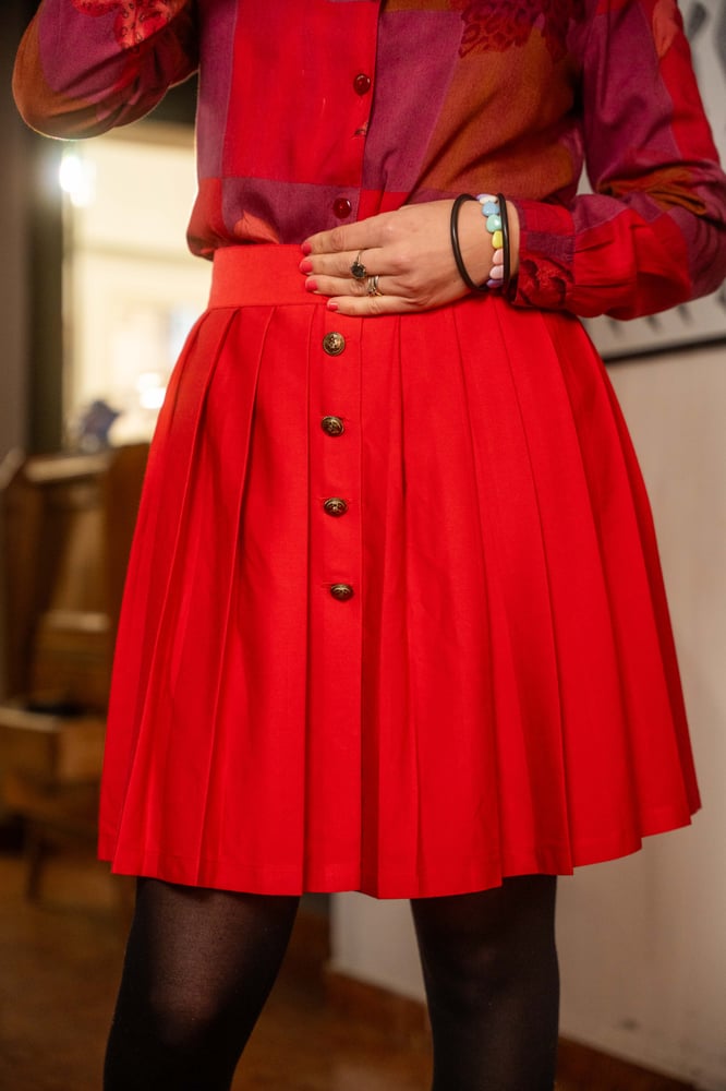 Image of Gonna a pieghe rossa