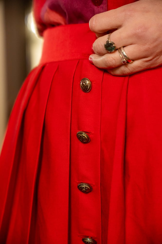 Image of Gonna a pieghe rossa