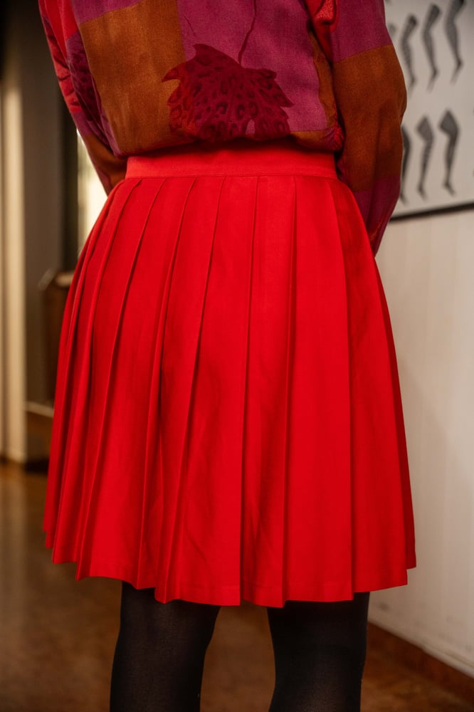 Image of Gonna a pieghe rossa