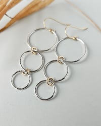 Image 1 of Two Tone Hammered 3 circle drop earrings