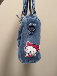 Image 3 of Hello kitty themed junk purse 