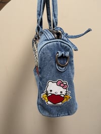 Image 4 of Hello kitty themed junk purse 