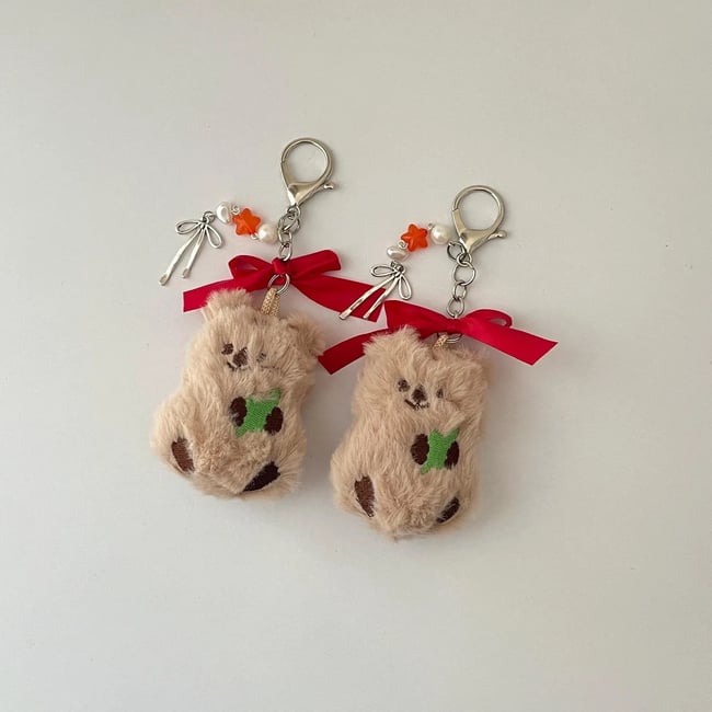 red bowed bear charm