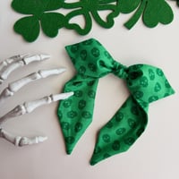 Tossed Green Skulls Headband