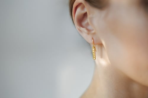 Image of Plain light silver earrings with gilding and without with inscription in Latin