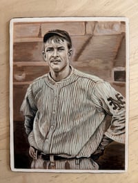 Image 1 of Christy Mathewson with his book, Won in the Ninth, on the back