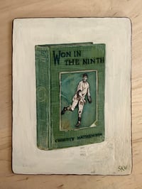 Image 2 of Christy Mathewson with his book, Won in the Ninth, on the back