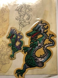 Image 1 of 80’s dragon patches and tattoo tracings 
