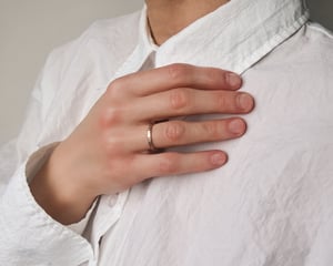 Image of 18ct rose gold 2mm flat court Horn Texture ring