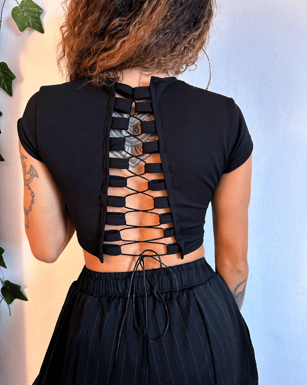 Image of versatile black lycra crop top