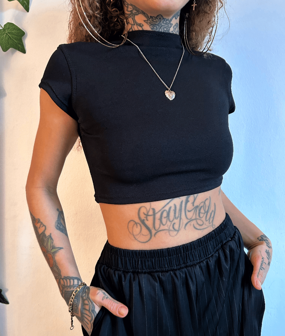 Image of versatile black lycra crop top