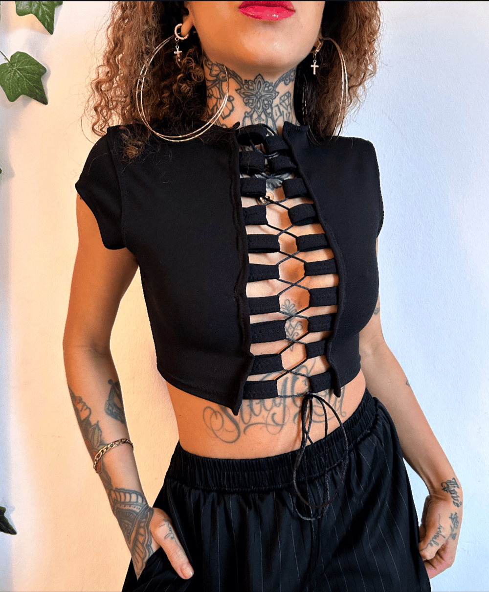 Image of versatile black lycra crop top