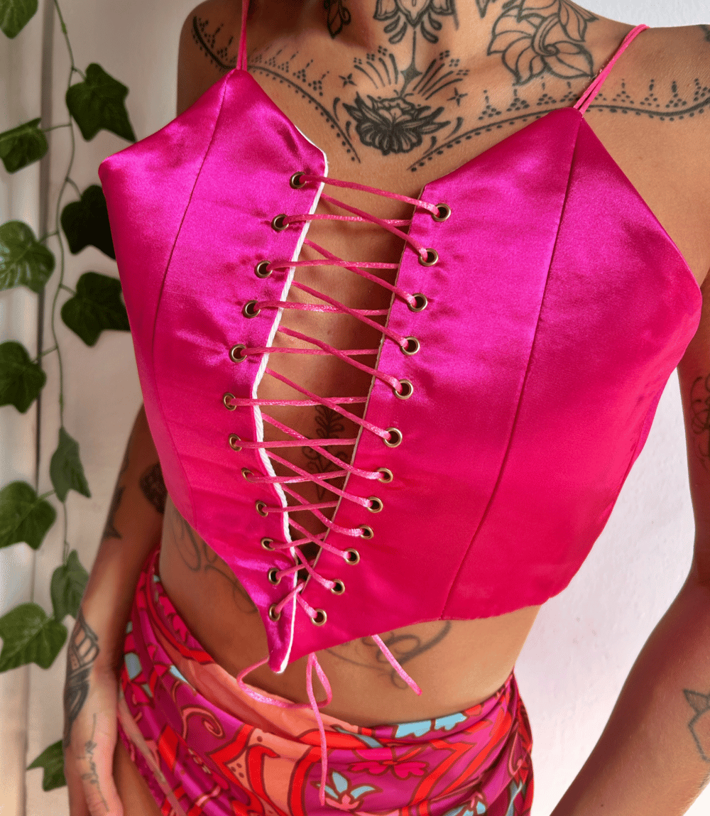 Image of adjustable satin pink front lace corset 