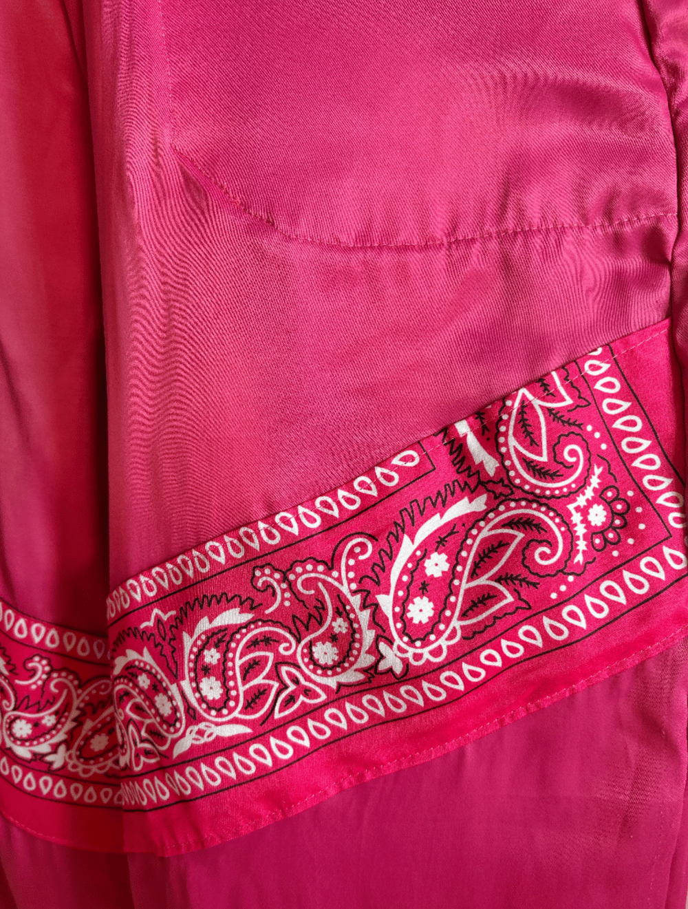 Image of the pink satin bandana trousers 