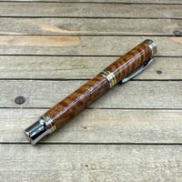 Image 2 of Handmade Curly Satinwood Rollerball Pen with a Hawaiian Theme