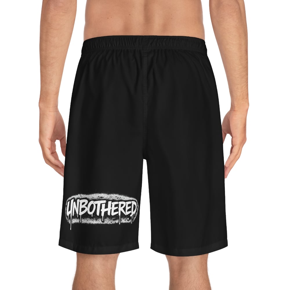 Image of Board Shorts — "Talked About by Many, Confronted by None" Unbothered Graphic