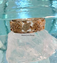 Image 1 of 14k ocean Hawaiian ring
