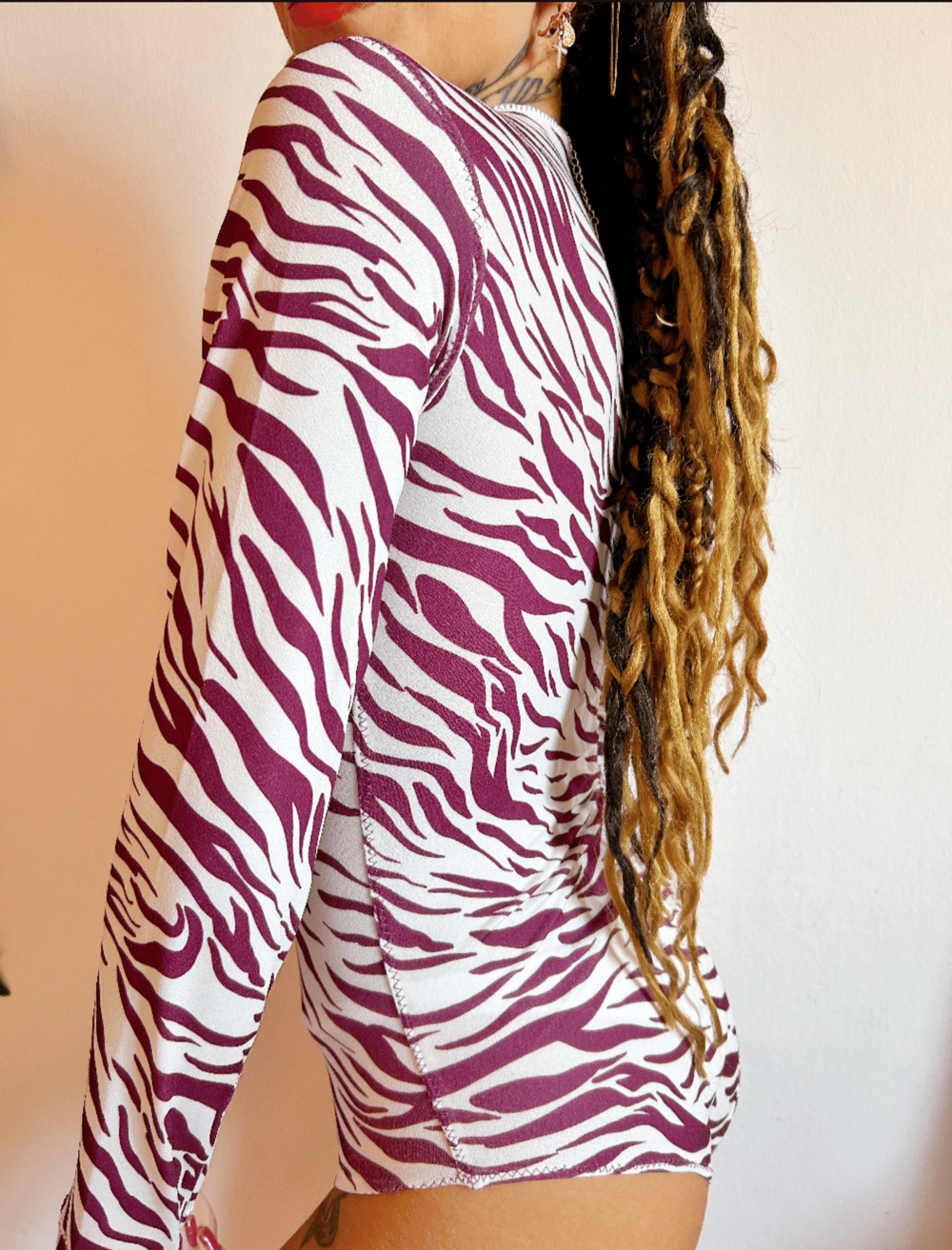 Image of the lavender haze zebra bodysuit 