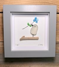 Seaglassbird, blue seaglass flower