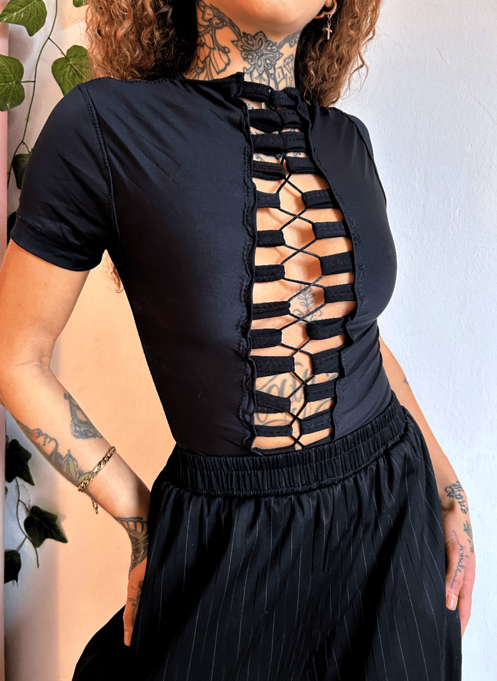 Image of adjustable black lycra blouse
