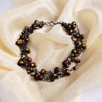 Image 1 of Bracelet golden and purple 