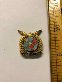Image 1 of 1980s International Tattoo Artists Association pin 