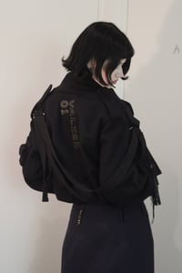 Image 2 of The Strapped Bomber, small