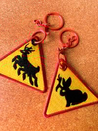 Image 1 of Cryptid Warning Sign - Embroidered Keychain