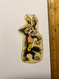 Image 1 of 1970’s Spaulding & Roger’s hand colored pork chop flash Coyote