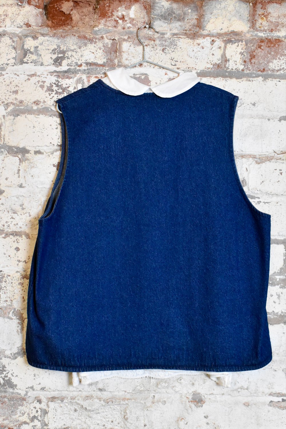 Image of embroidered denim gilet + white blouse 