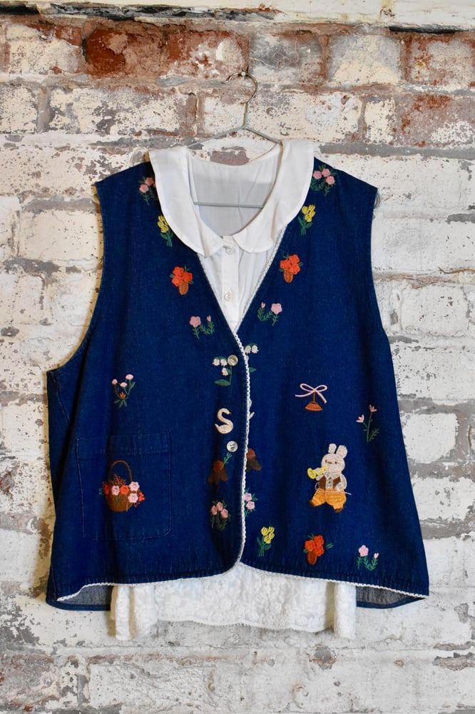 Image of embroidered denim gilet + white blouse 
