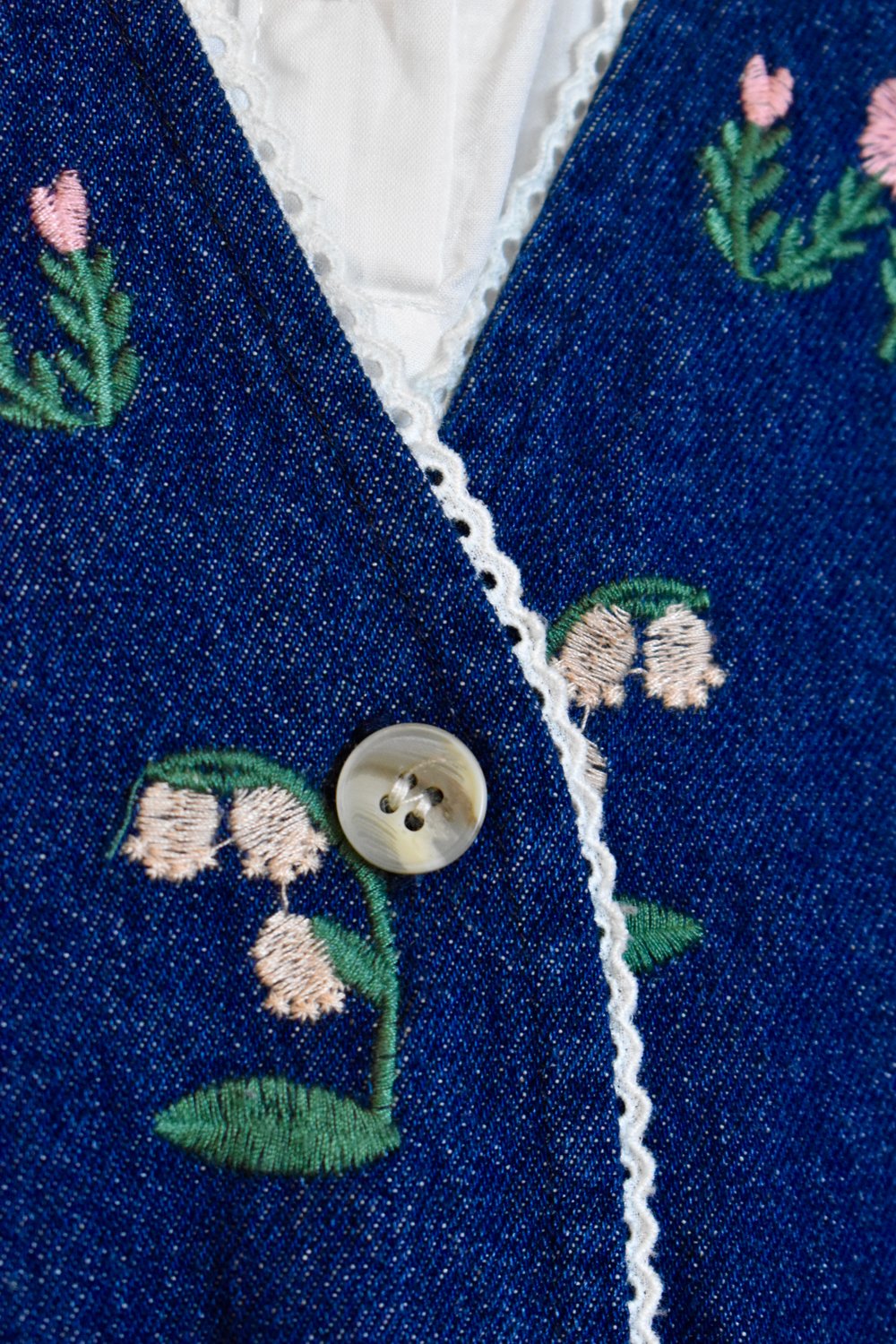 Image of embroidered denim gilet + white blouse 