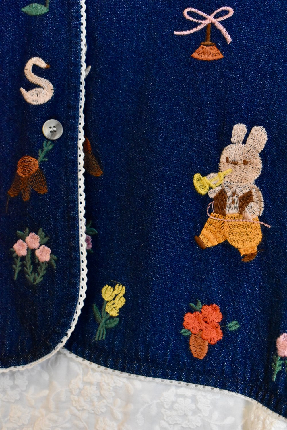 Image of embroidered denim gilet + white blouse 